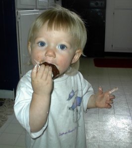 Hannah eating ice cream after her haircut